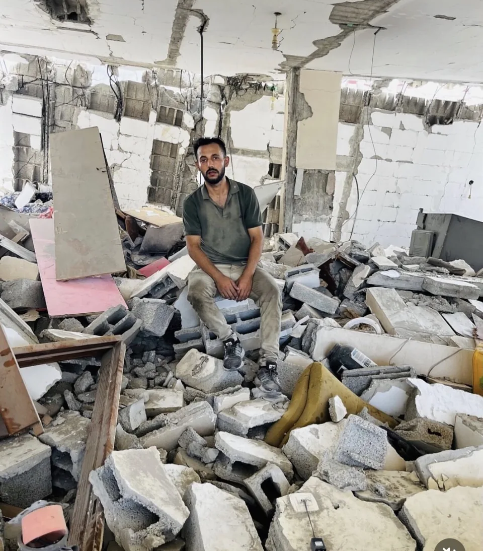 Mohammed in the ruins of a bombed building, Gaza, May 2025